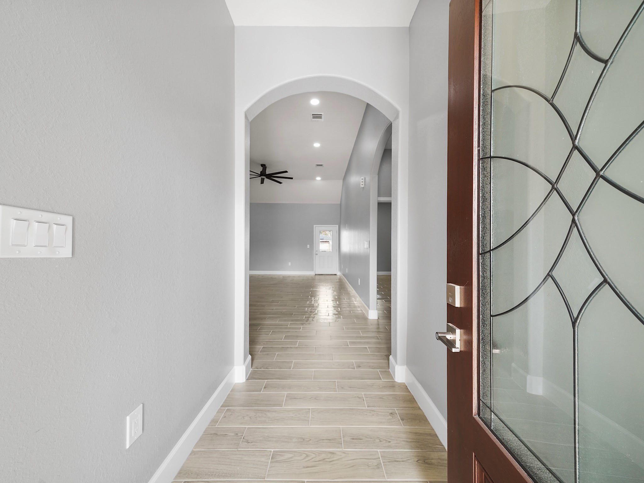 2448 Areba Street Houston, TX 77091 - Photo 2 of 19 Step inside to soaring ceilings and beautiful tile flooring that immediately create a bright, open feel throughout the home.