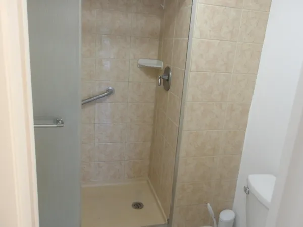 a view of balcony with furniture