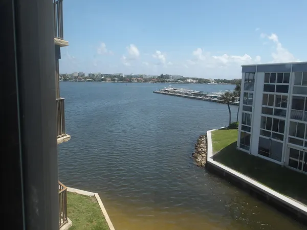 a bathroom with a toilet a sink and shower