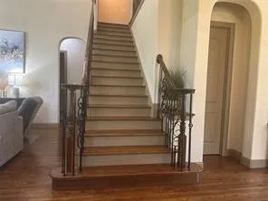 a view of entryway with wooden floor