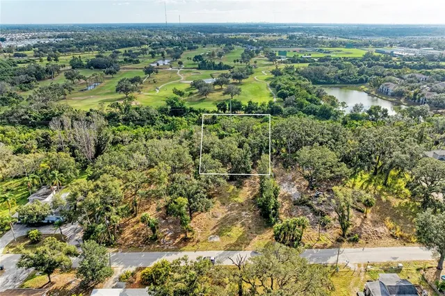 a view of a field with an outdoor space