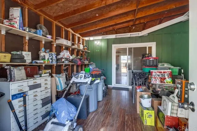 a view of a chairs room with gym equipment
