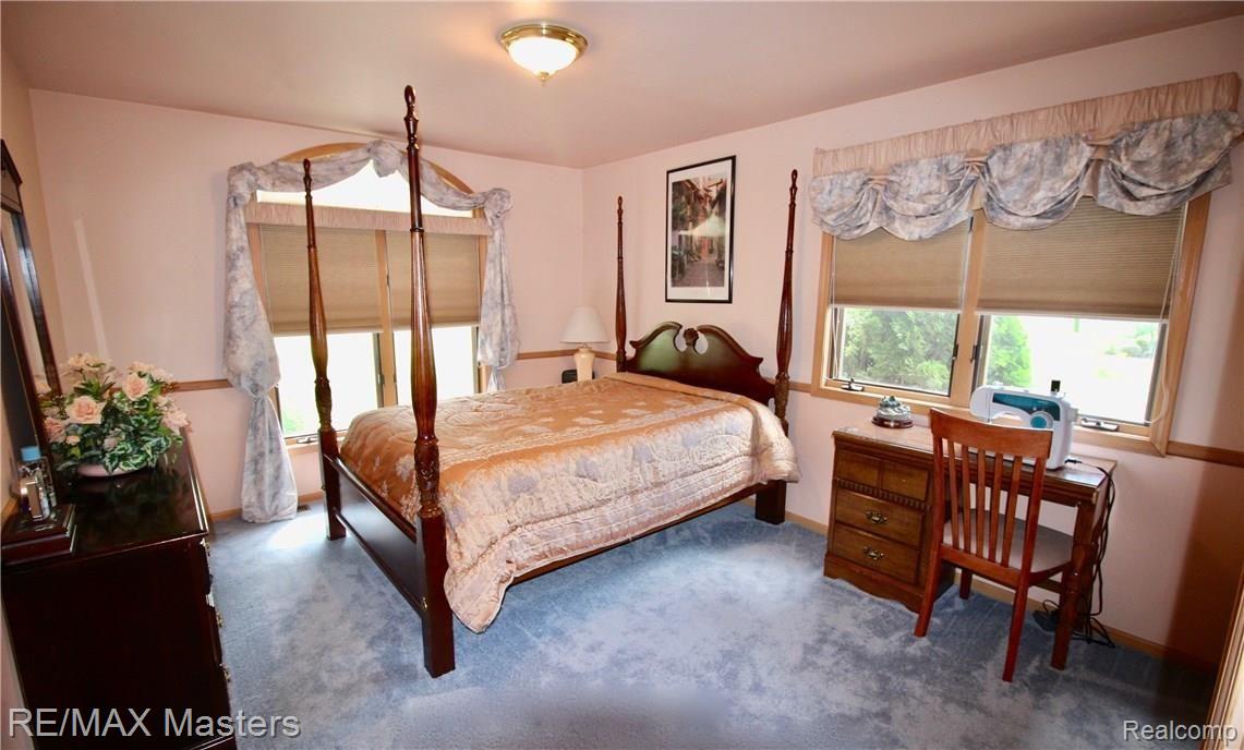 26454 Rinne Road New Boston, MI 48164 - Photo 20 of 41 Second bedroom has great natural lighting, transom window, and large closet.