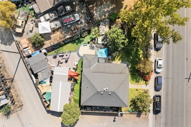 an aerial view of residential houses with outdoor space