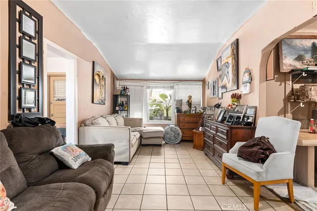 a living room with furniture and a couch