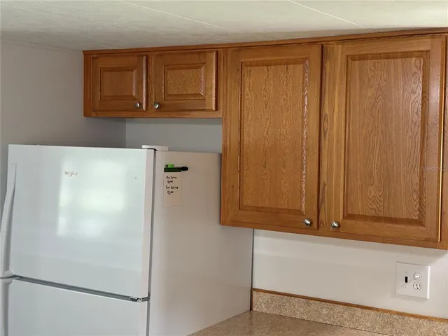 a view of hallway with windows