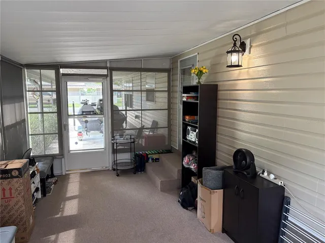 a view of livingroom with furniture and windows
