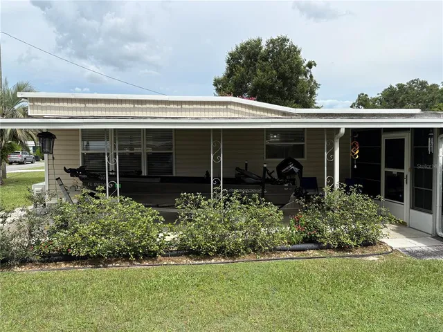 front view of house with a yard