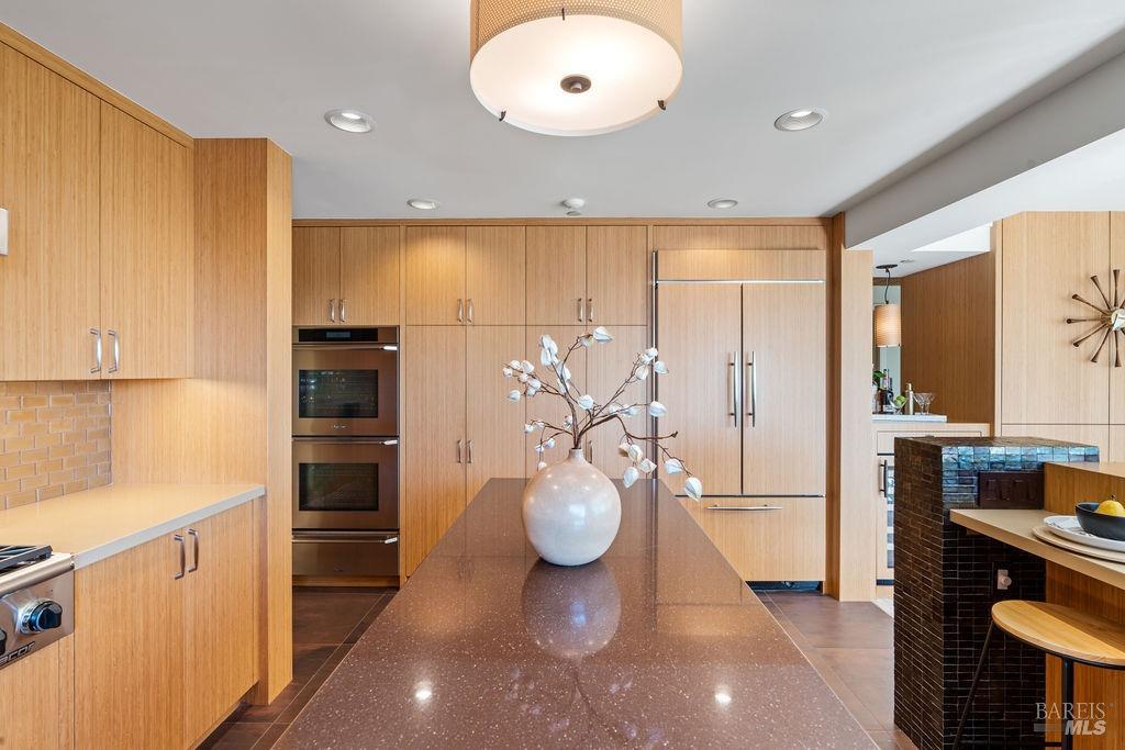 The custom bamboo cabinetry designed  by AlterECO of Sausalito provides an organic feel and eco-friendly choice.  Quartz countertops provide the finishing touch.
