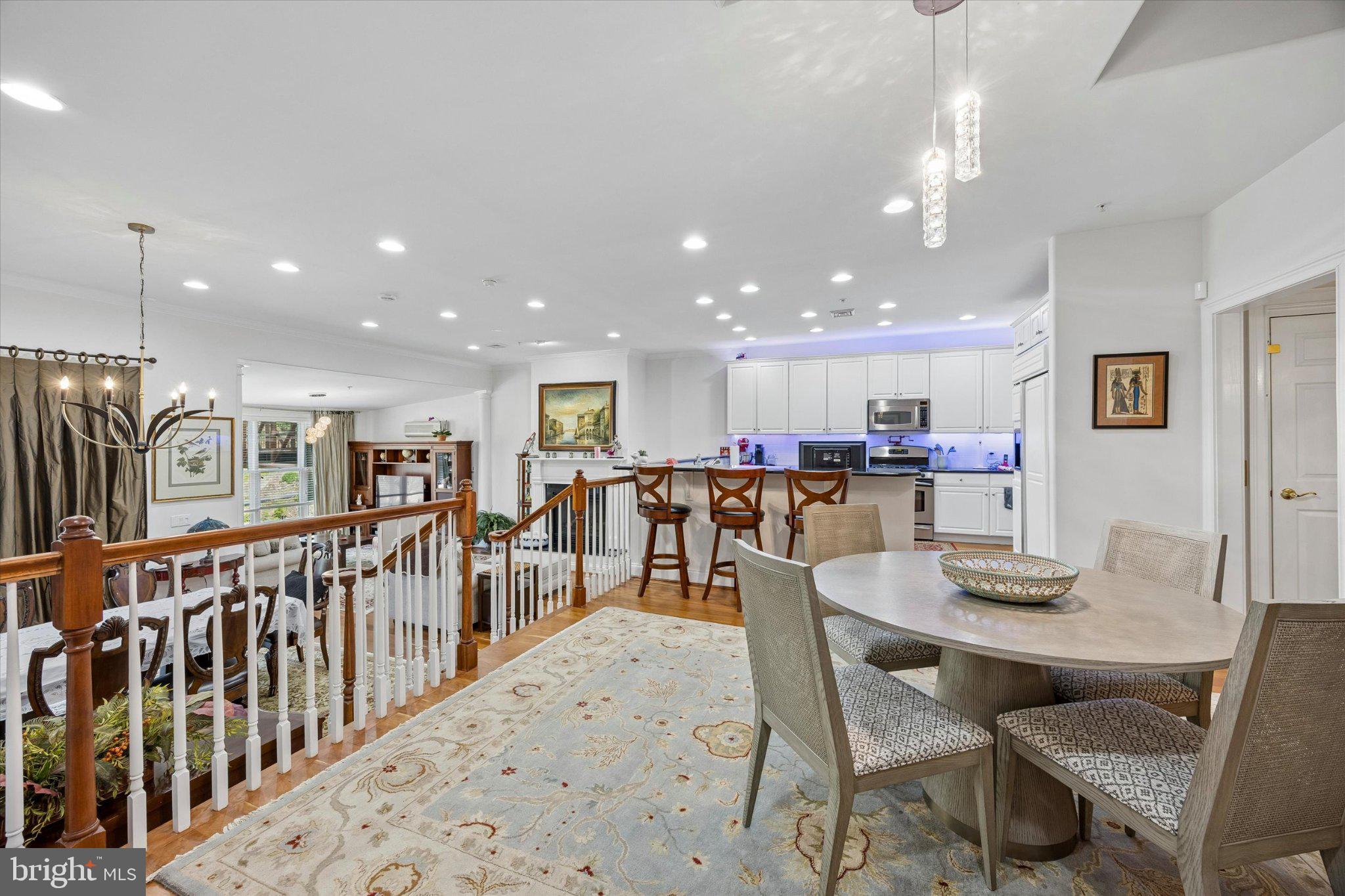 126 Bancroft Mills Road, Unit 14 Wilmington, DE 19806 - Photo 11 of 35 a dining room with furniture and a table