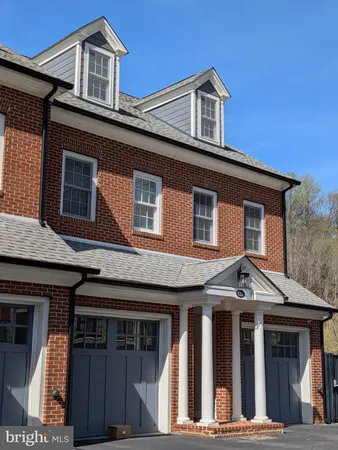a front view of a house with a porch