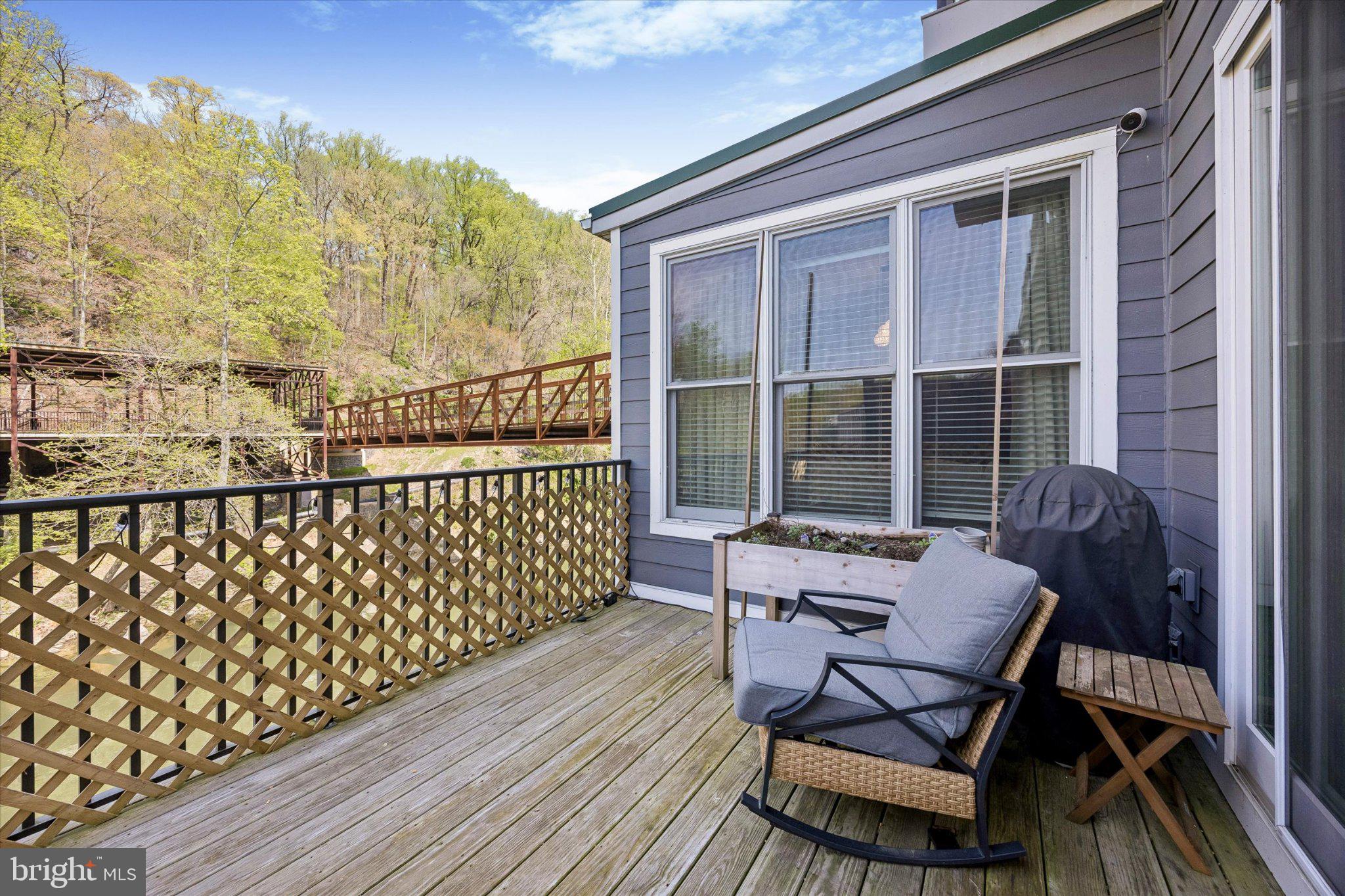 126 Bancroft Mills Road, Unit 14 Wilmington, DE 19806 - Photo 5 of 35 a view of a balcony with furniture