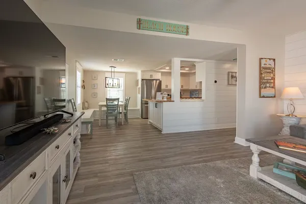 a view of a living room and dining room