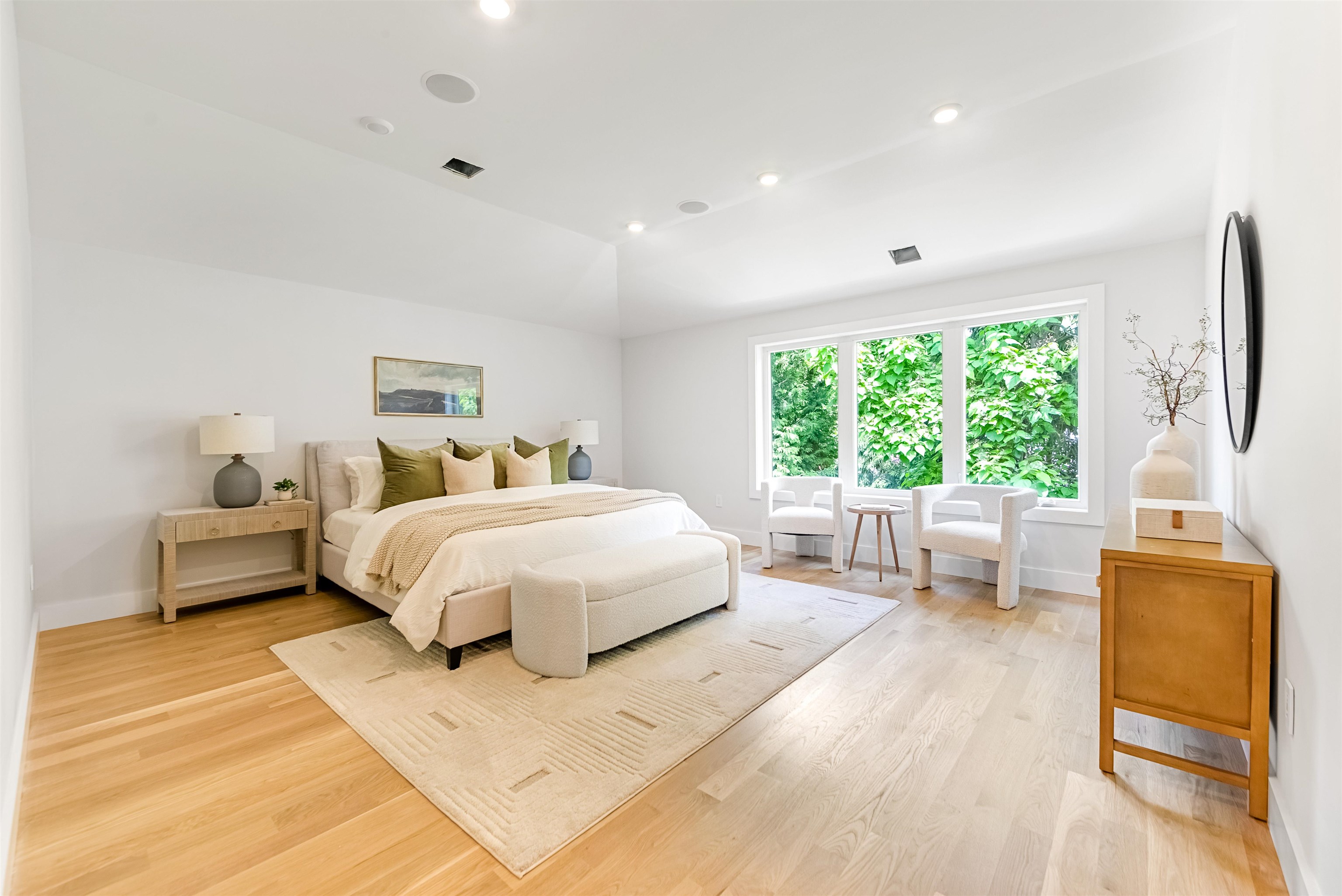 429 Riverside Avenue Rutherford, NJ 07070 - Photo 11 of 26 a bedroom with a large bed and a large window