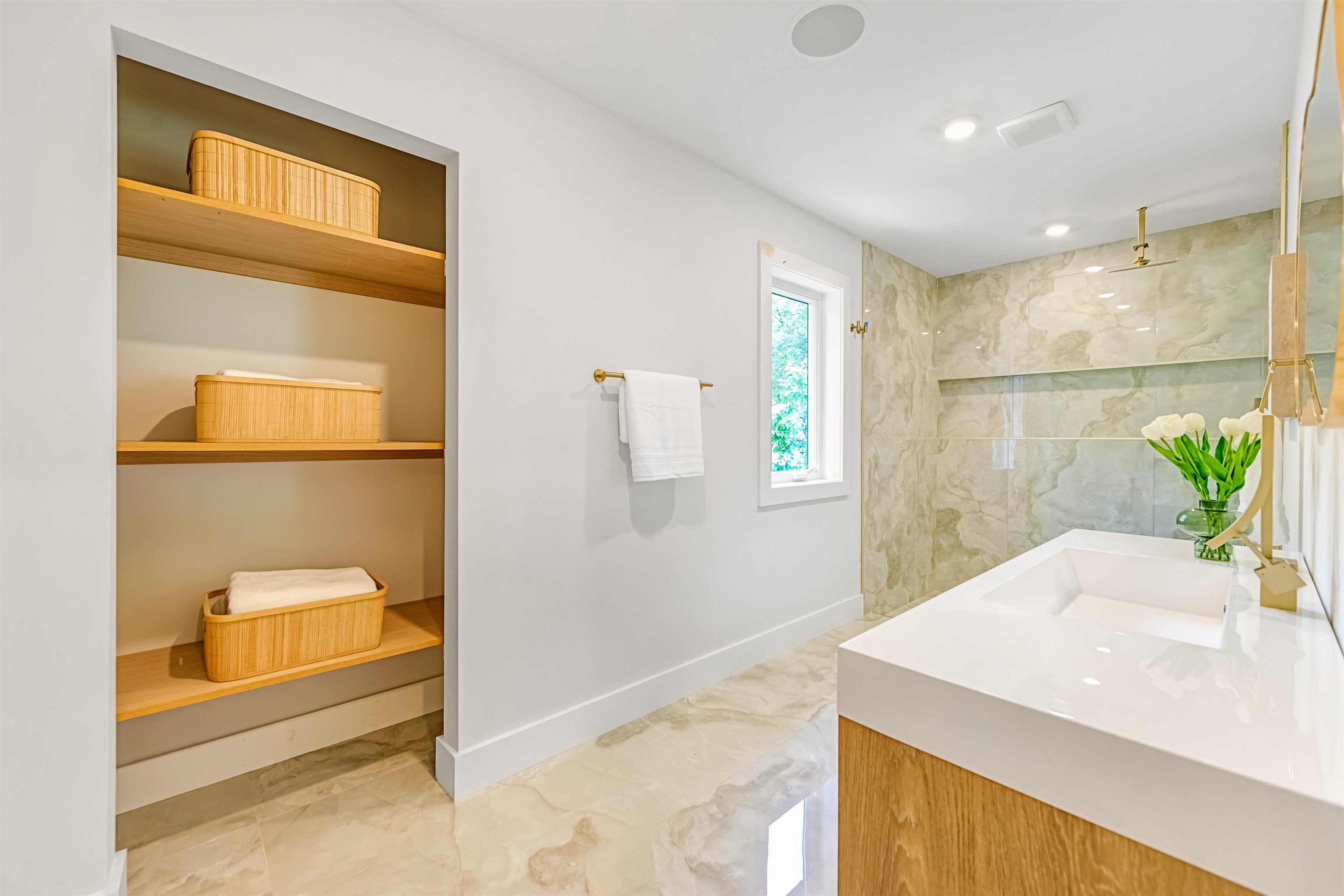 429 Riverside Avenue Rutherford, NJ 07070 - Photo 15 of 26 a bathroom with a granite countertop sink a mirror and a shower