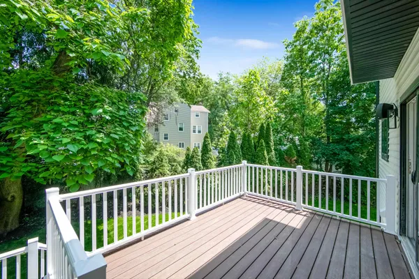 a view of a wooden roof deck