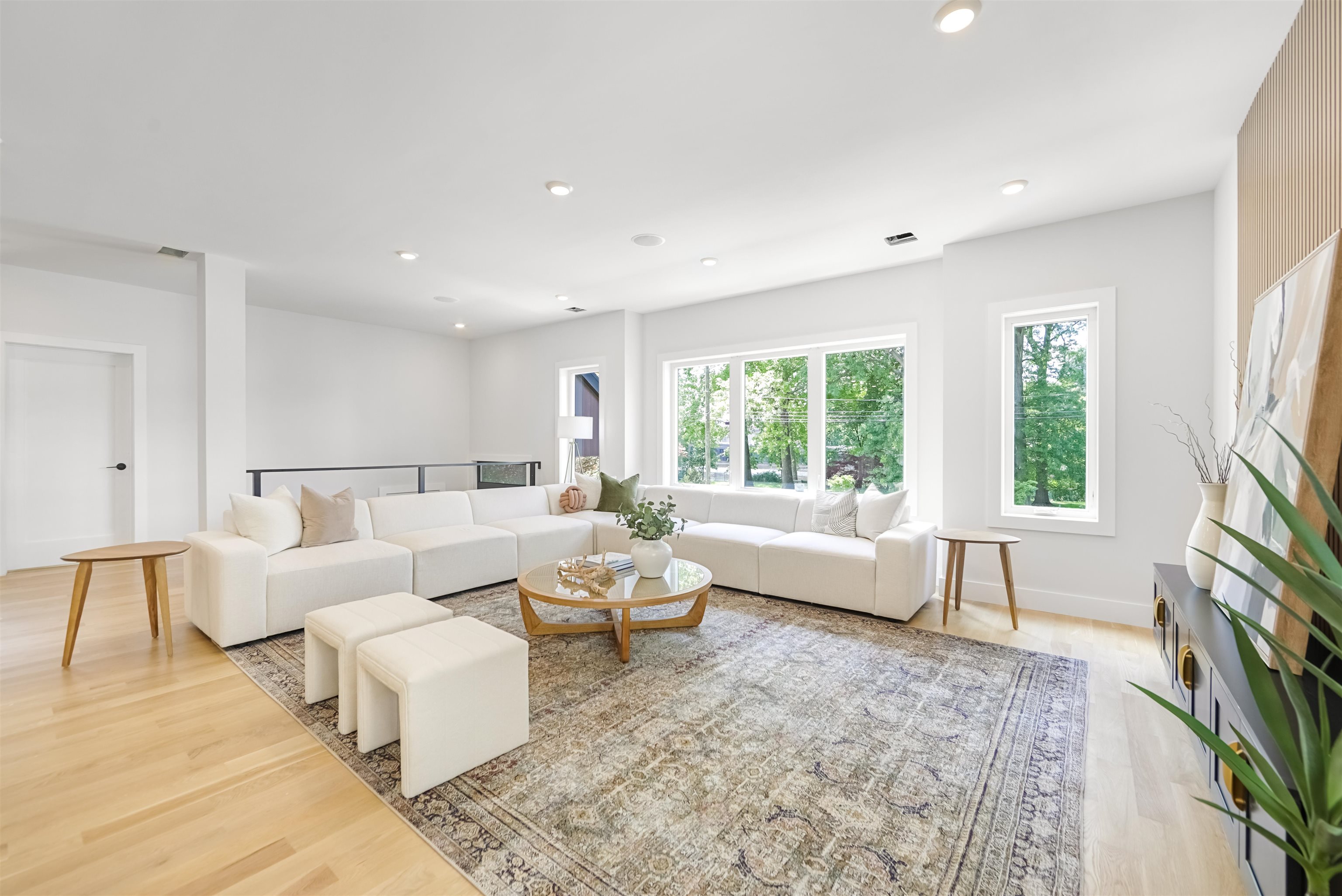 429 Riverside Avenue Rutherford, NJ 07070 - Photo 5 of 26 a living room with furniture and a flat screen tv