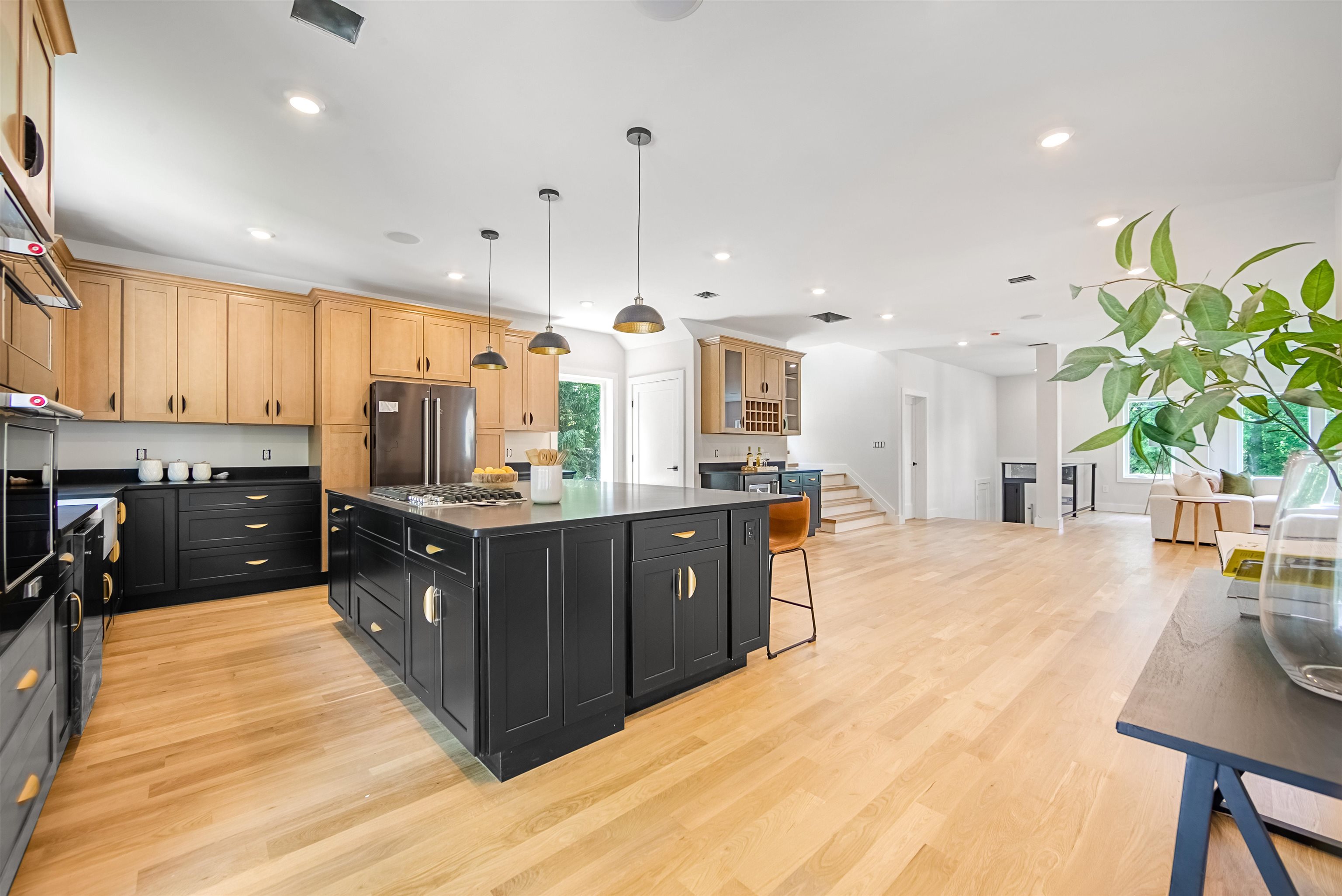 429 Riverside Avenue Rutherford, NJ 07070 - Photo 7 of 26 a large kitchen with lots of counter space and windows