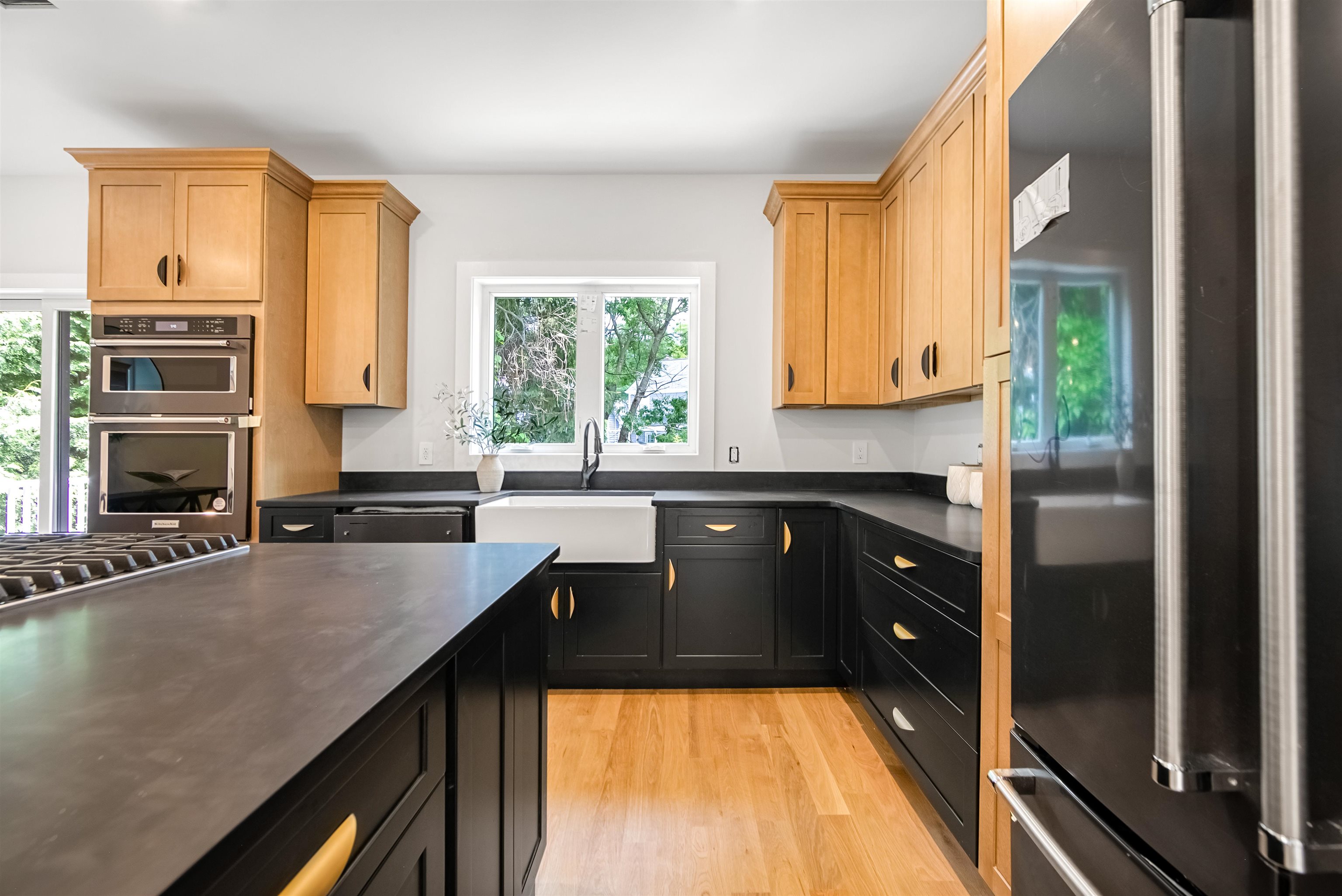 429 Riverside Avenue Rutherford, NJ 07070 - Photo 10 of 26 a kitchen with a refrigerator a sink and a stove