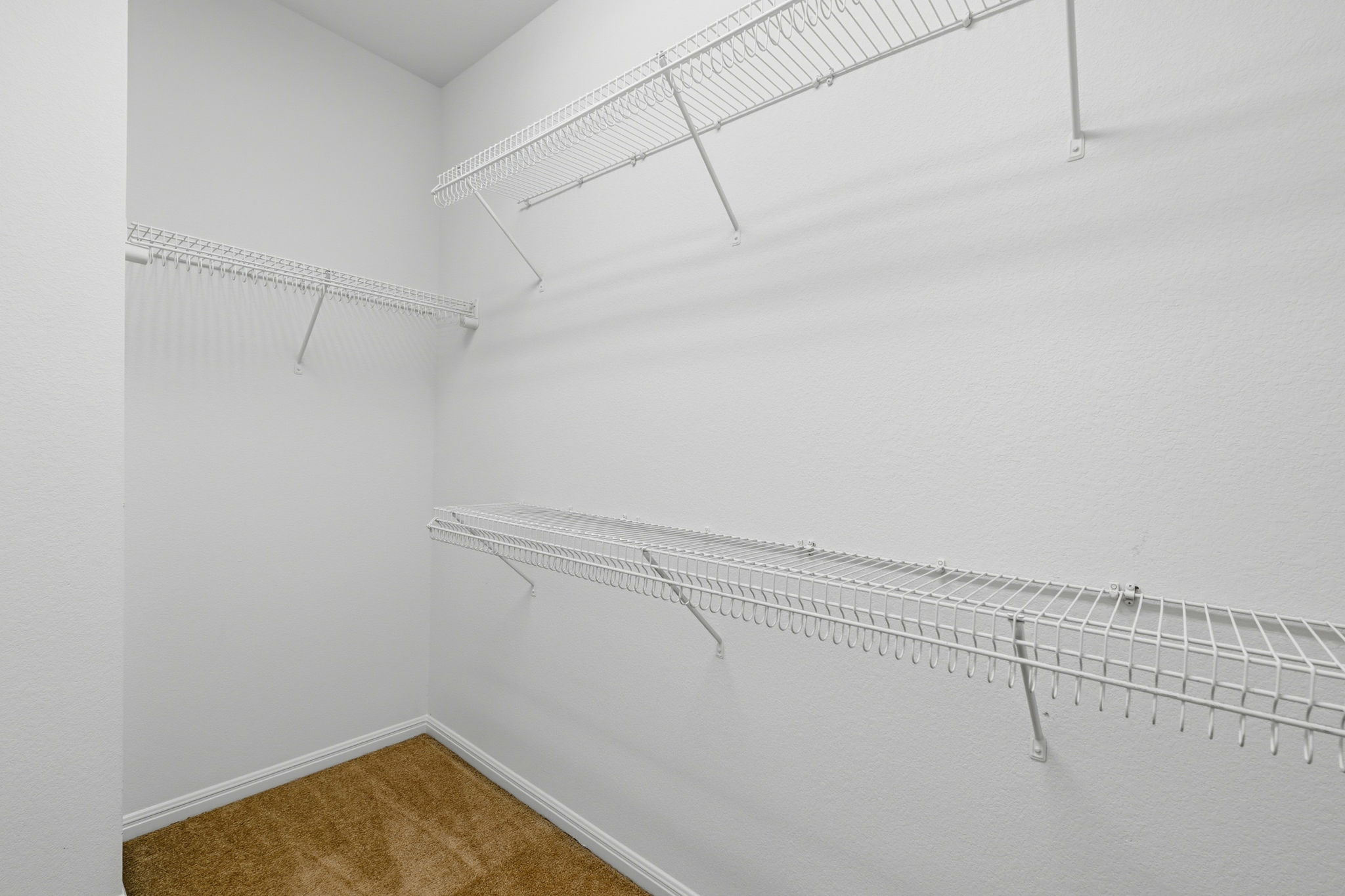 708 Texas Drive Georgetown, TX 78633 - Photo 17 of 27 Spacious walk in closet in primary bedroom.