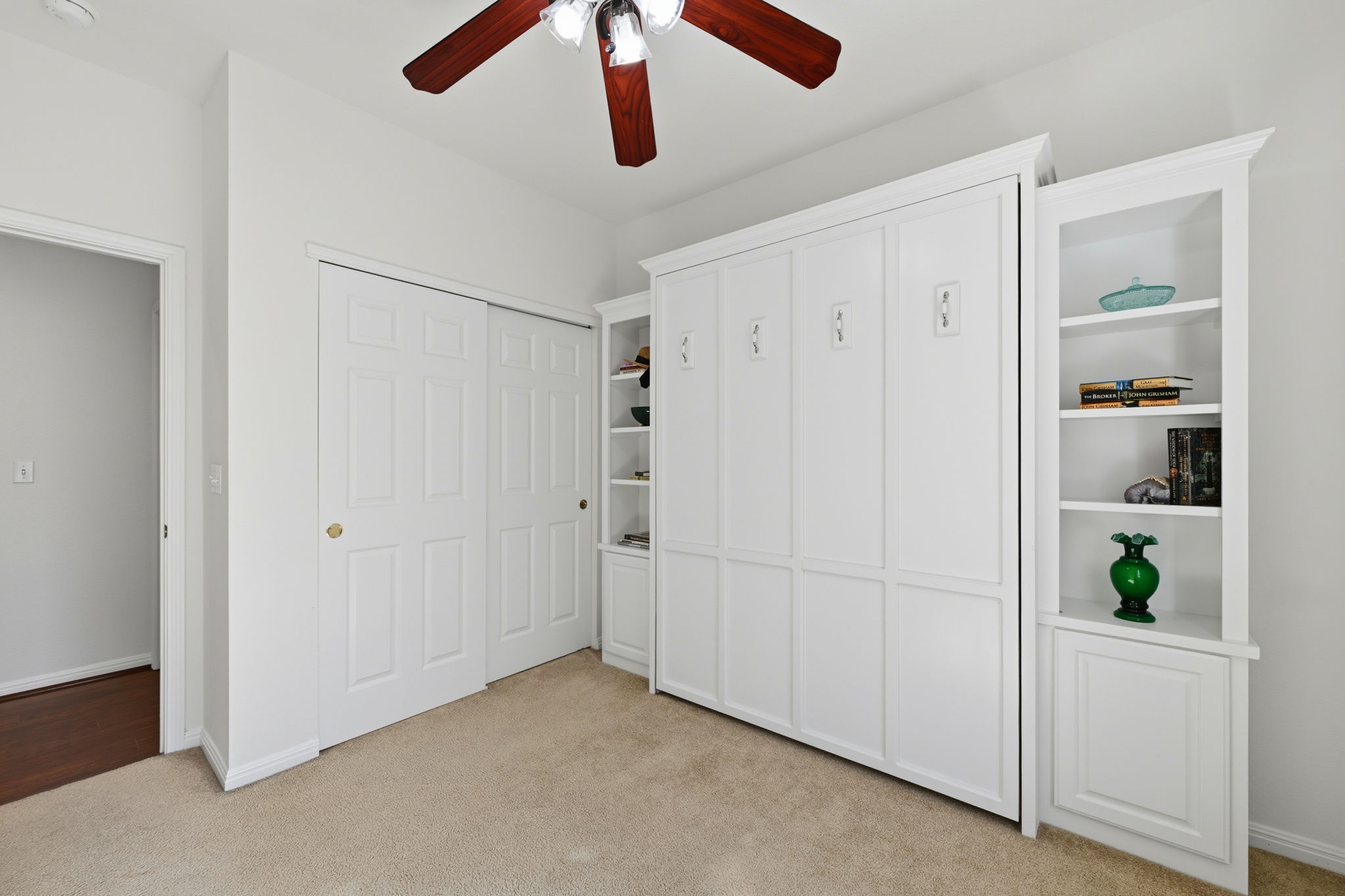 708 Texas Drive Georgetown, TX 78633 - Photo 19 of 27 Second bedroom perfect for a craft room or office with Murphy Bed for overnight guests.