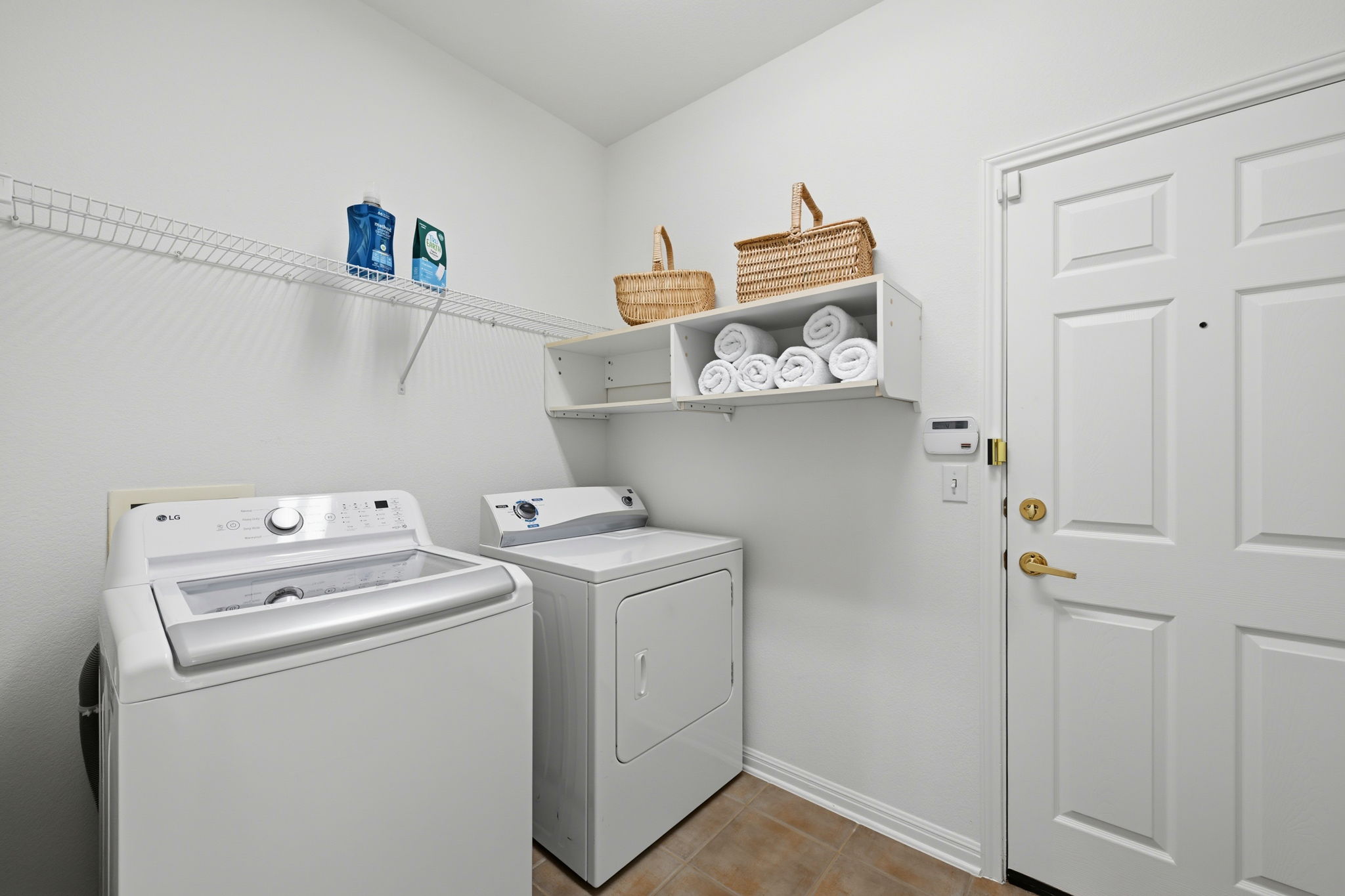 708 Texas Drive Georgetown, TX 78633 - Photo 21 of 27 Spacious laundry room with plenty of shelving. Washer/Dryer convey.