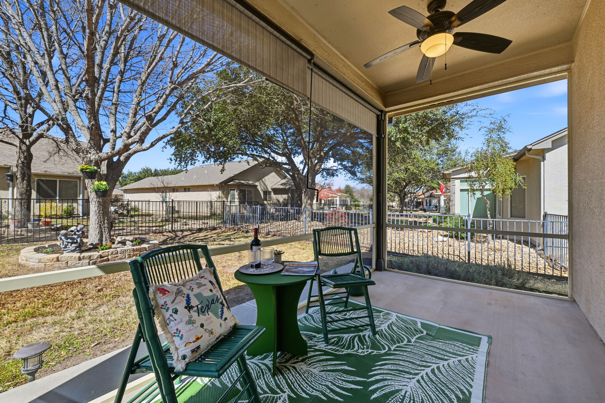 708 Texas Drive Georgetown, TX 78633 - Photo 22 of 27 Relaxing screened in patio with pull down screens and ceiling fan.