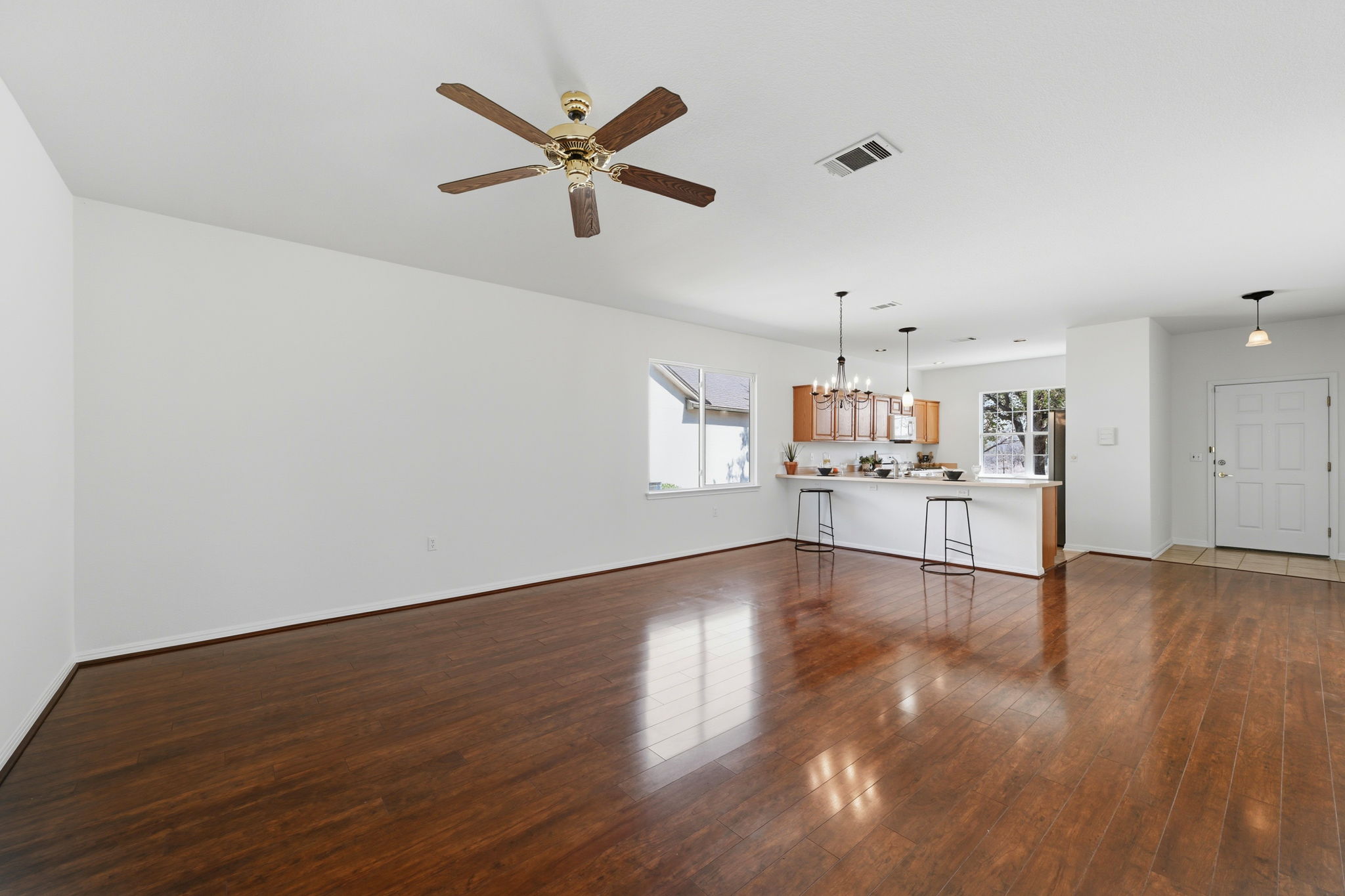 708 Texas Drive Georgetown, TX 78633 - Photo 4 of 27 Living area to kitchen.