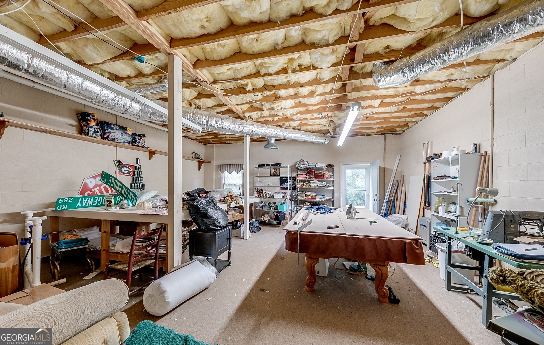 119 Yarbrough Ridgeway Road Commerce, GA 30529 - Photo 29 of 50 a view of a room with lots of stuff and lots of furniture