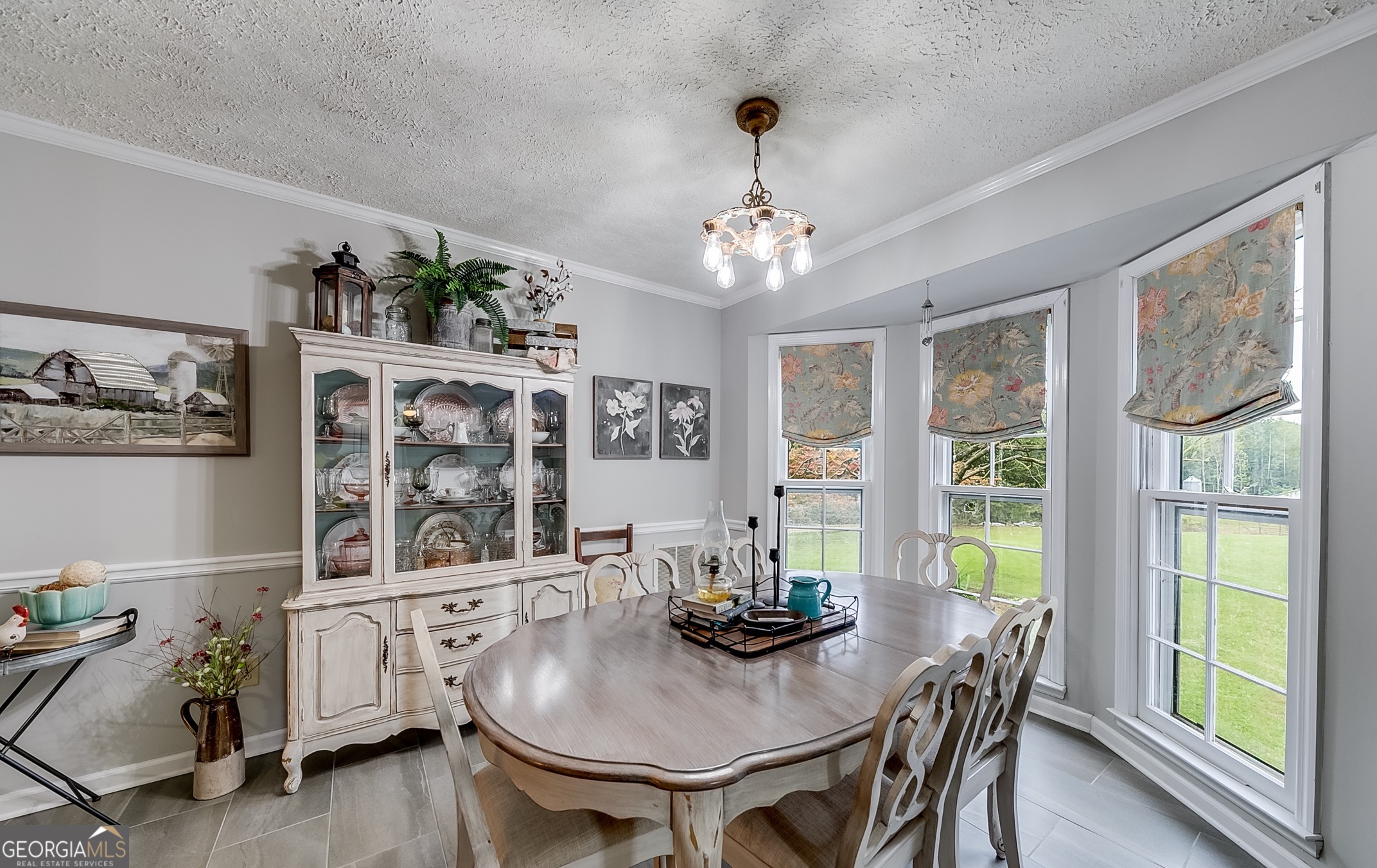 119 Yarbrough Ridgeway Road Commerce, GA 30529 - Photo 8 of 50 a view of a dining room with furniture window and outside view