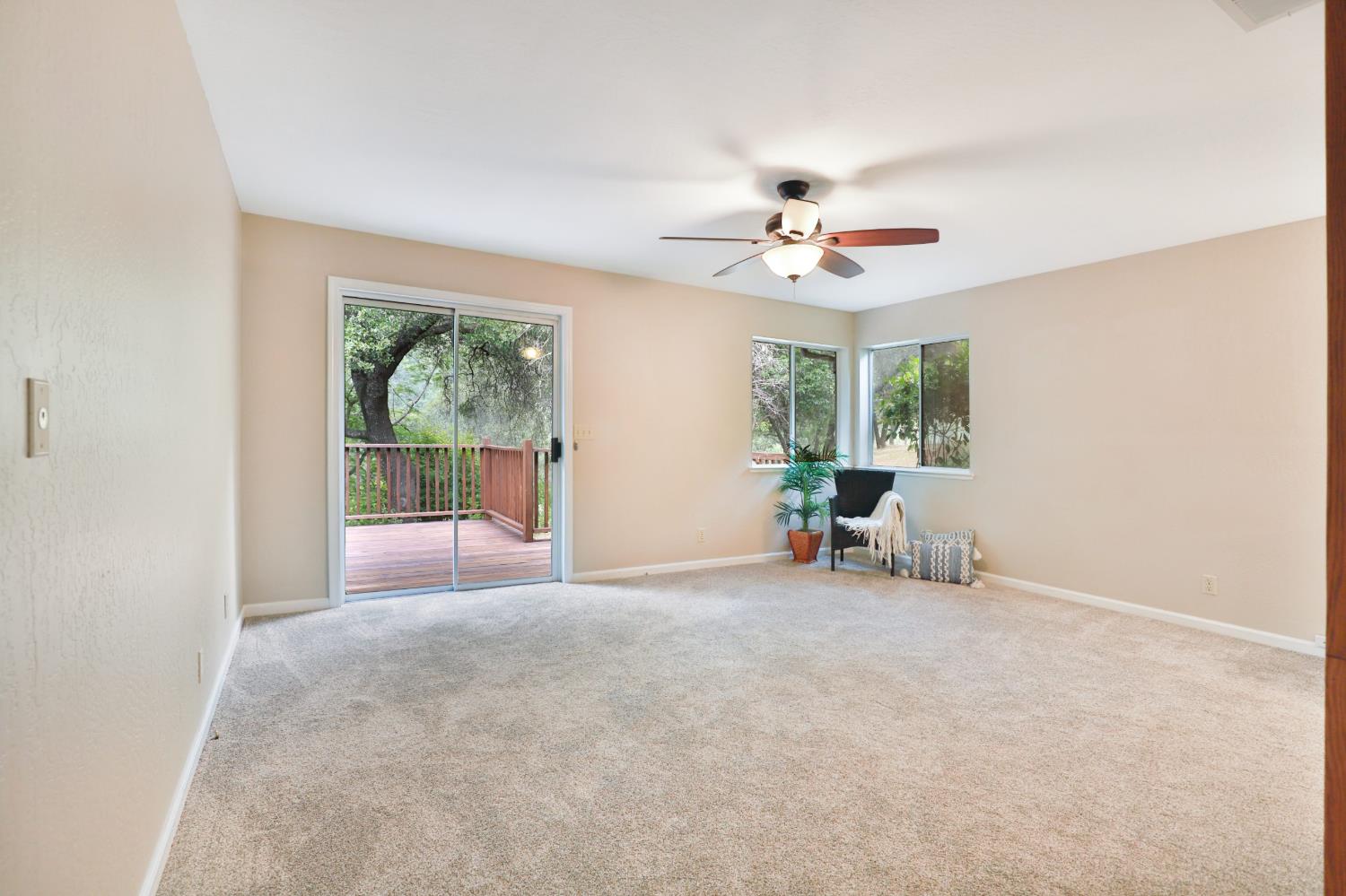 4773 Jacarah Road Placerville, CA 95667 - Photo 28 of 94 Master/primary bedroom has slider to back deck.