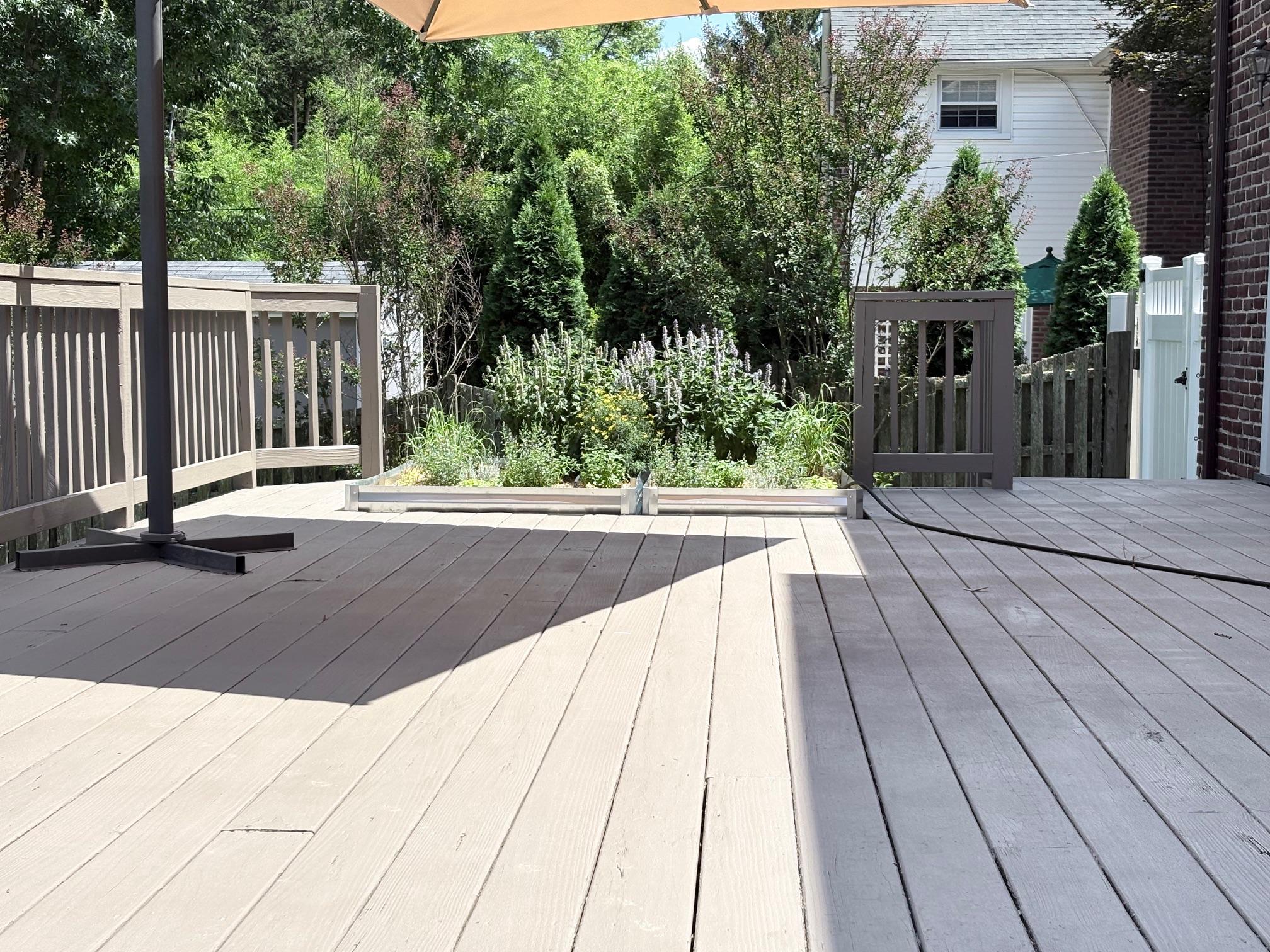 418 East Country Club Lane Wallingford, PA 19086 - Photo 48 of 60 Sunny deck with garden bed