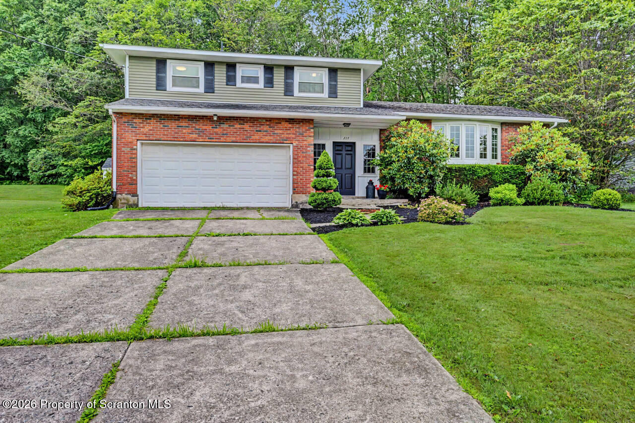 121 T Rt 351 Moscow, PA 18444 - Photo 79 of 79 a front view of a house with a yard and trees