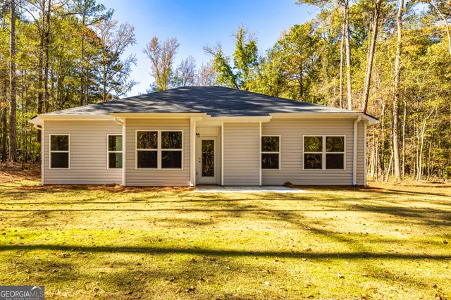 a view of a house with a swimming pool