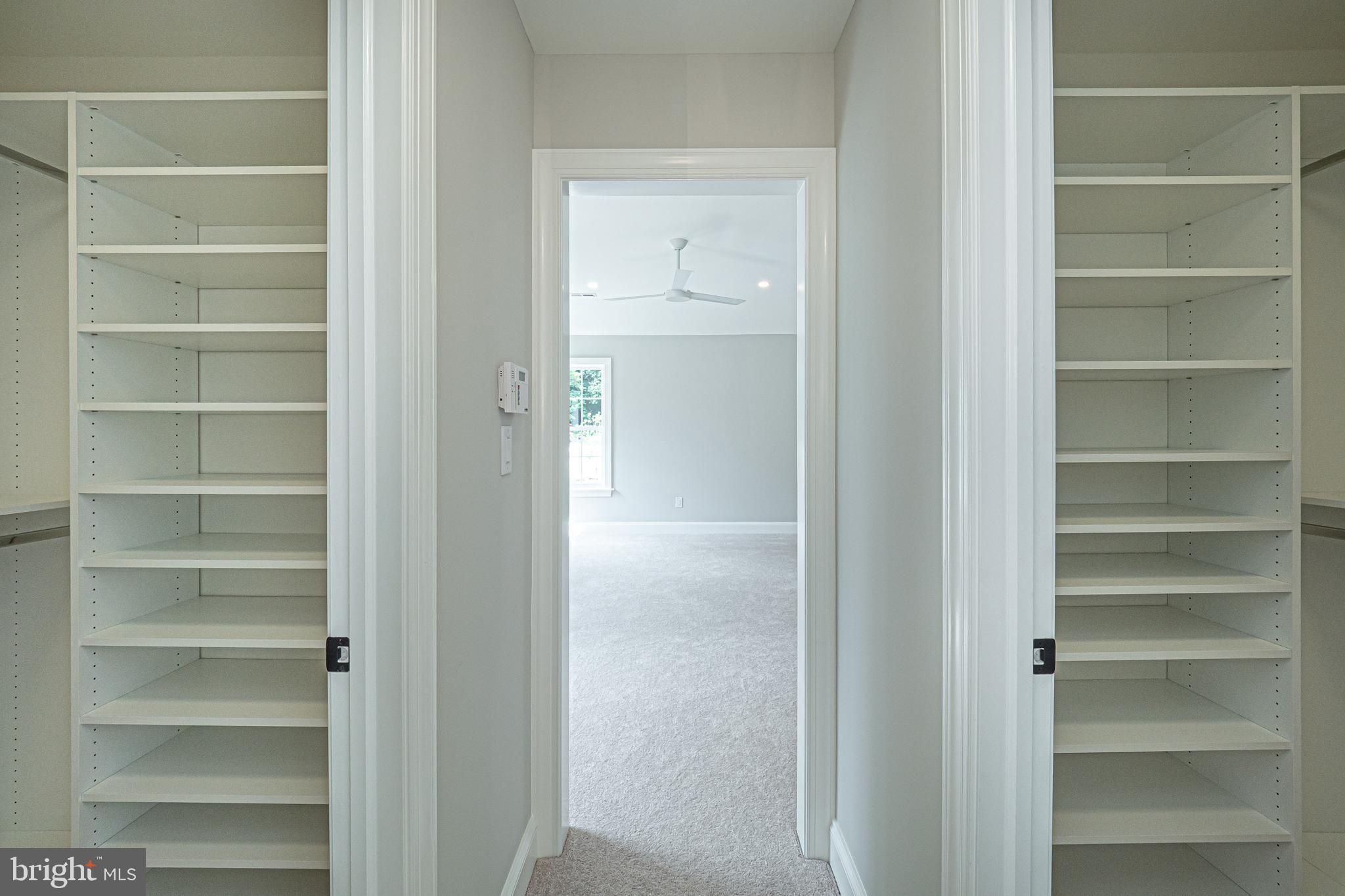 2 Timber Mill Lane, Unit SERENO Landenberg, PA 19350 - Photo 40 of 62 a view of walk in closet with empty racks