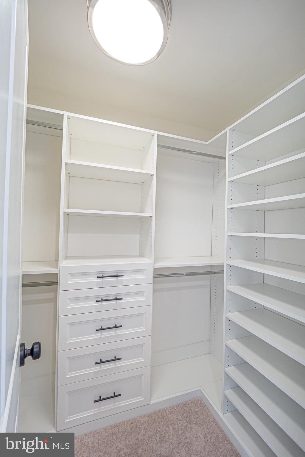 2 Timber Mill Lane, Unit SERENO Landenberg, PA 19350 - Photo 41 of 62 a view of walk in closet with empty racks