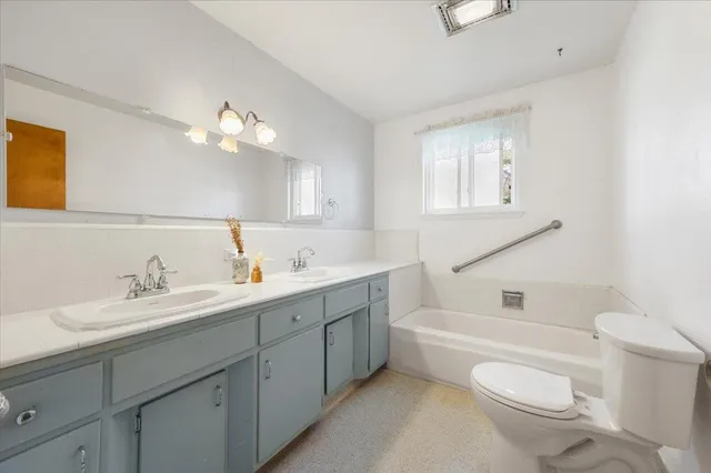 a view of a park with large trees