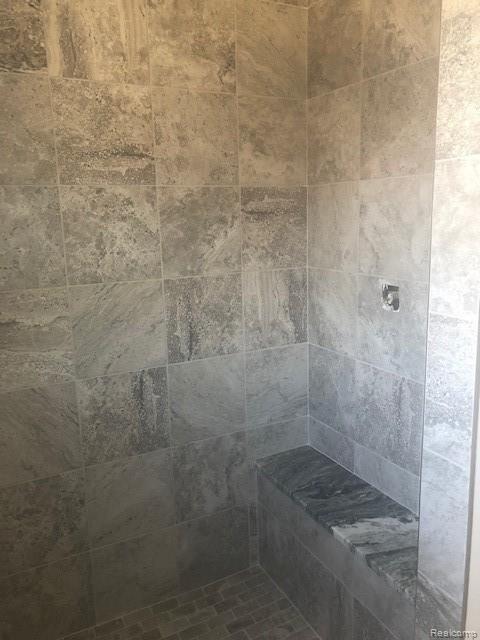 42663 Colonial Road Belleville, MI 48111 - Photo 8 of 11 Tiled Shower with Bench