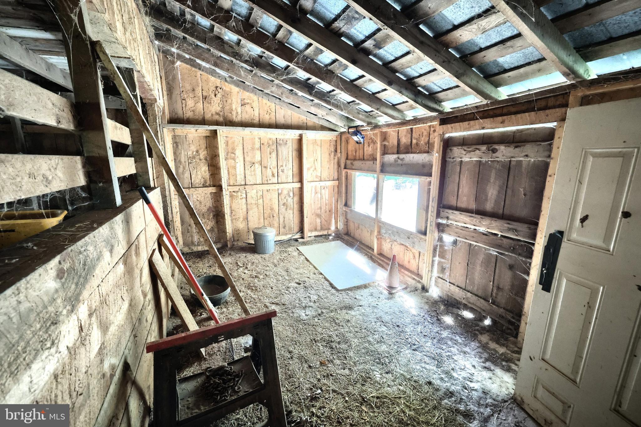456 Church Road Orrtanna, PA 17353 - Photo 24 of 65 a view of an empty room with wooden floor and windows