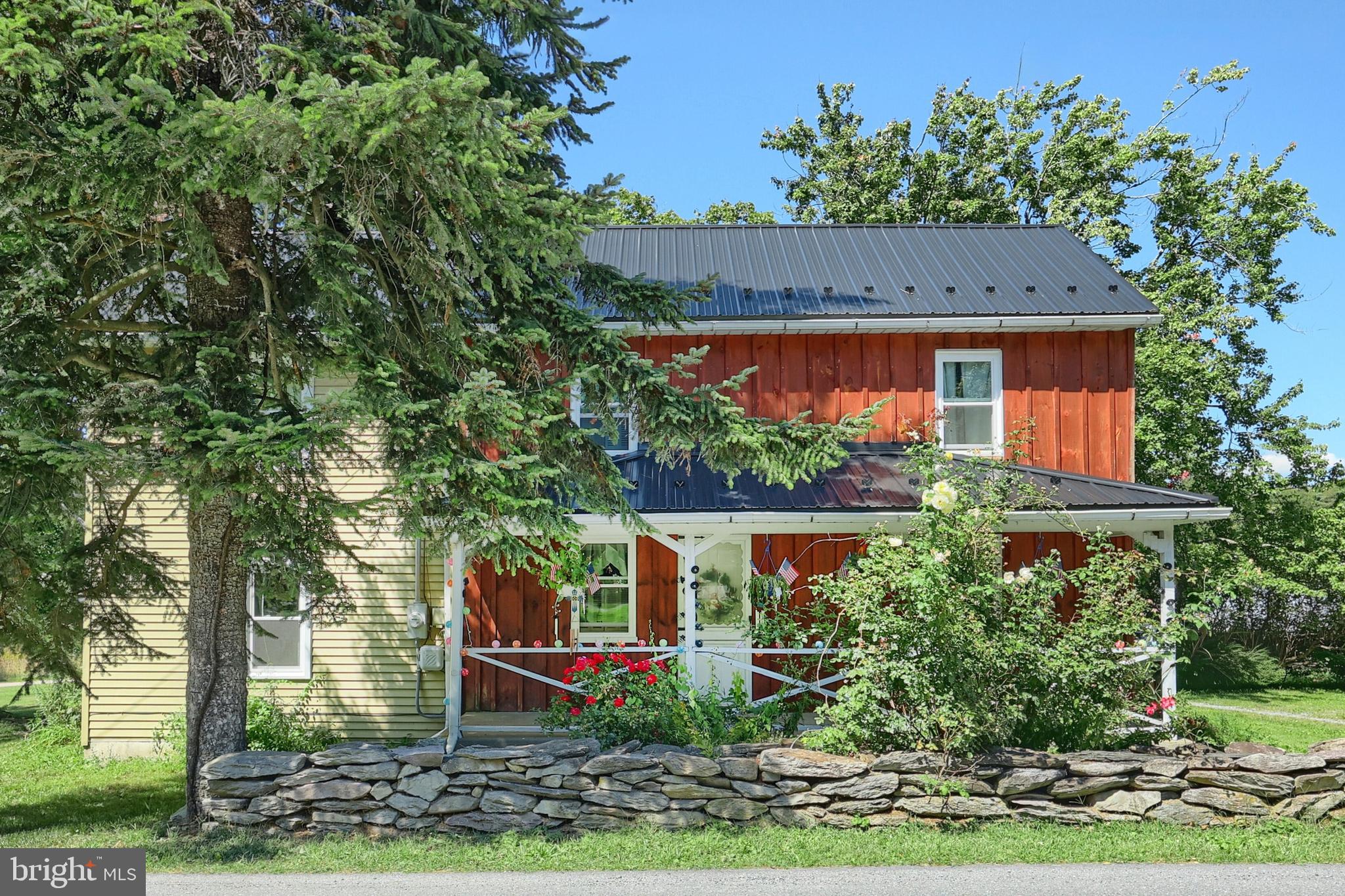 456 Church Road Orrtanna, PA 17353 - Photo 27 of 65 an outdoor space with seating area and trees in the background