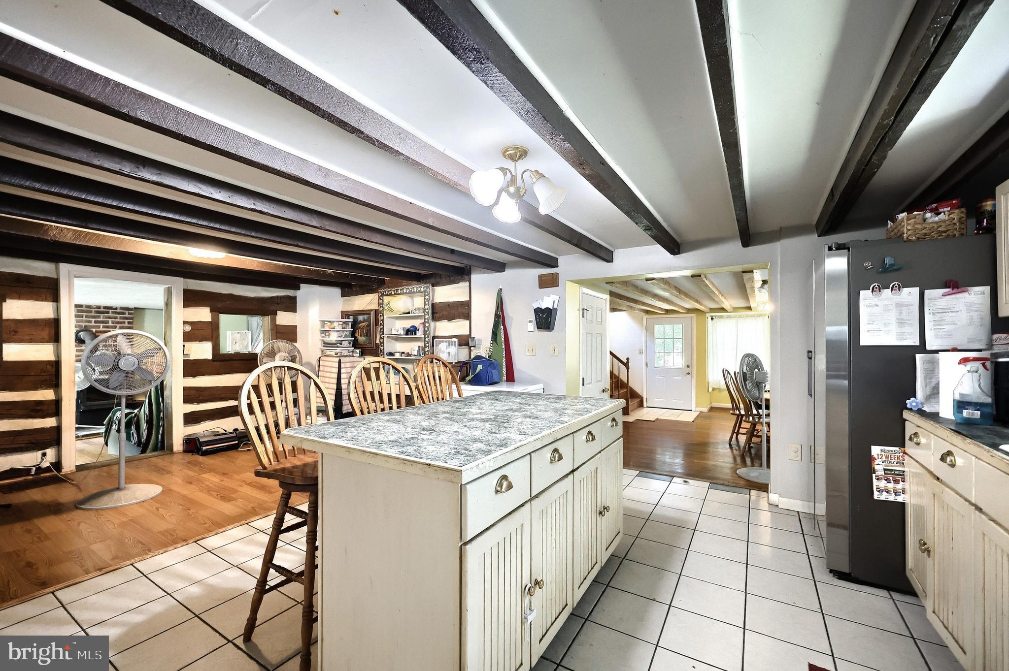 456 Church Road Orrtanna, PA 17353 - Photo 33 of 65 a dining room with furniture and a chandelier