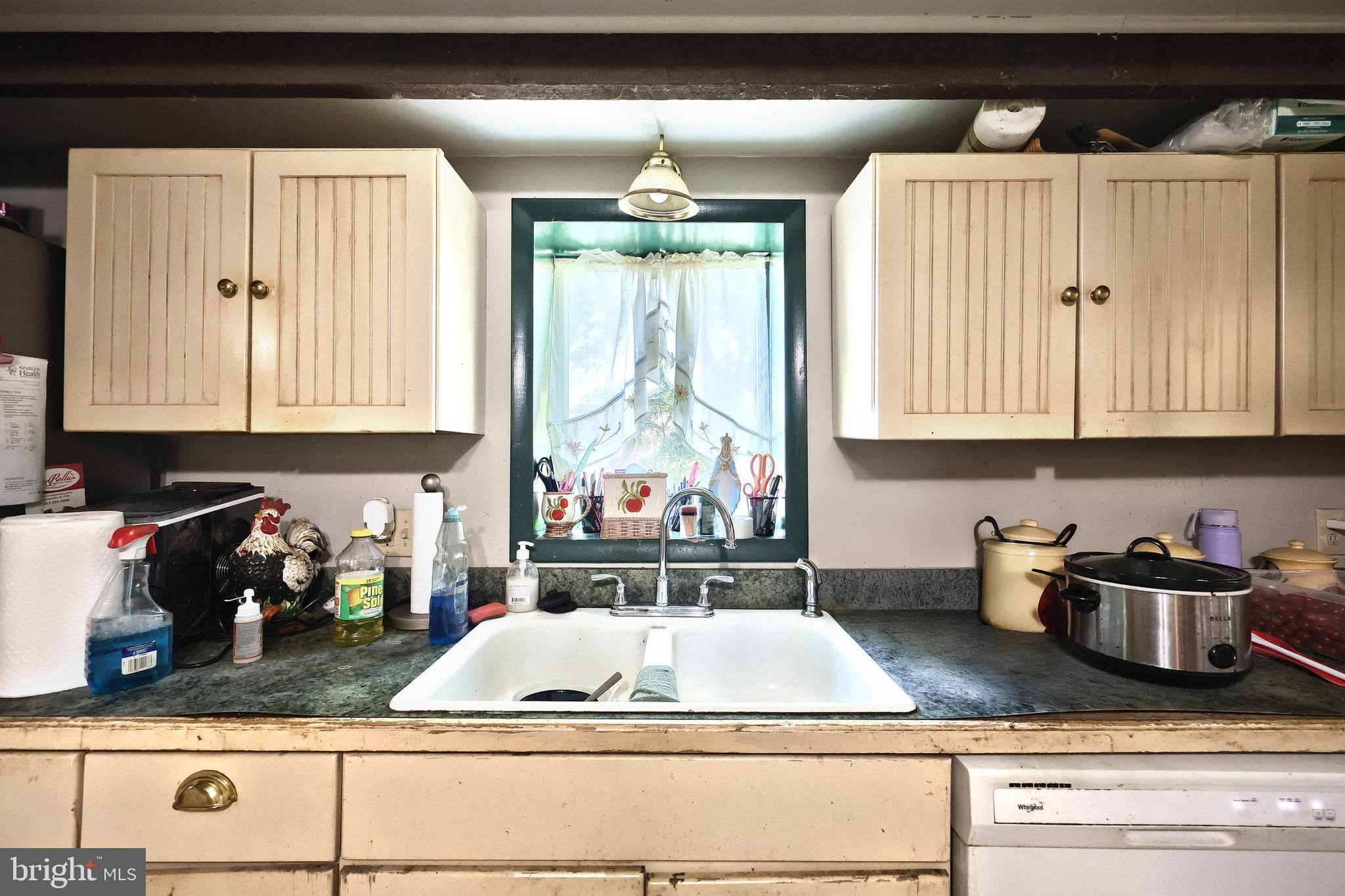 456 Church Road Orrtanna, PA 17353 - Photo 34 of 65 a kitchen with kitchen island granite countertop a sink a stove and cabinets