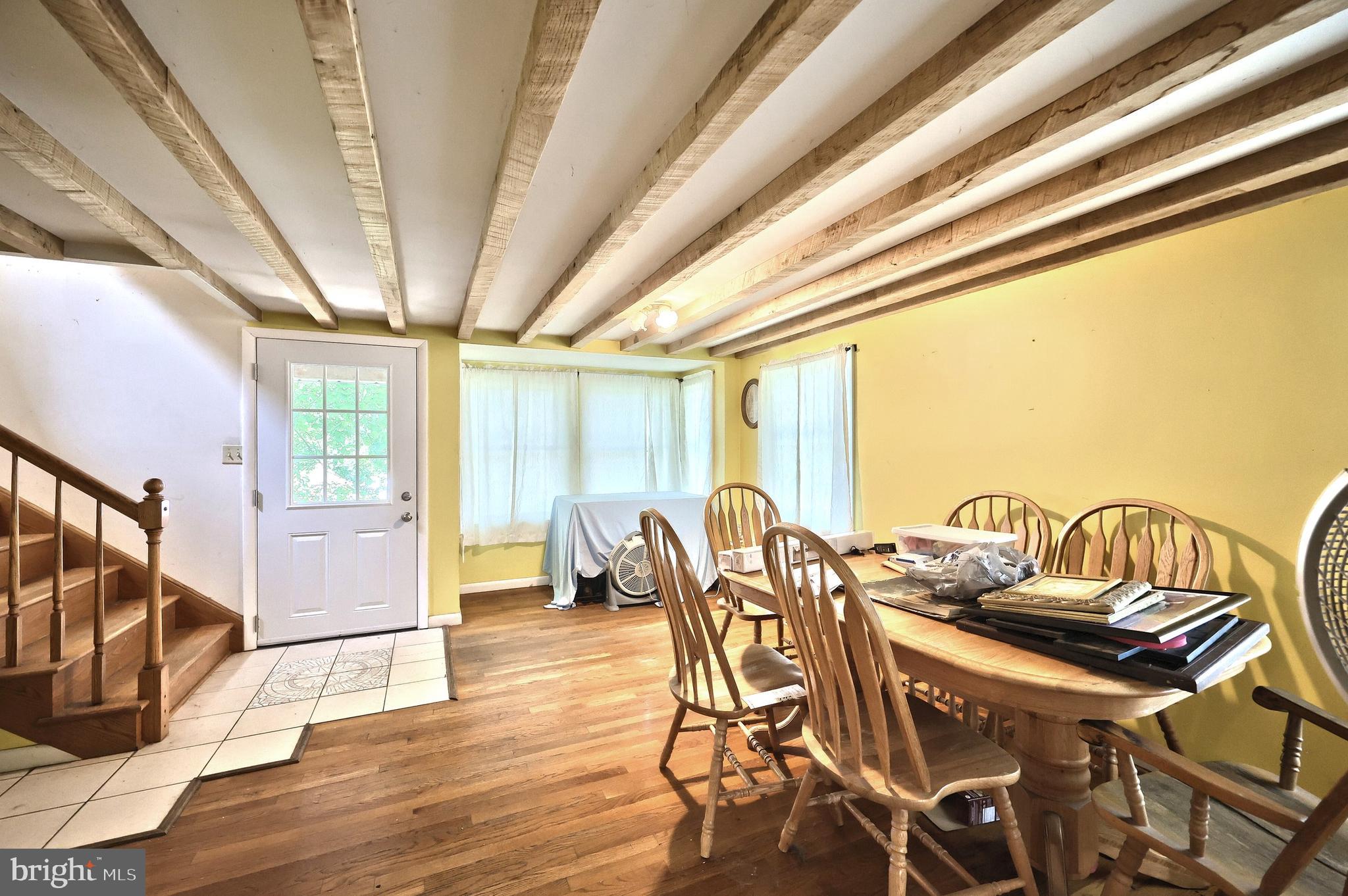 456 Church Road Orrtanna, PA 17353 - Photo 36 of 65 a view of a dining room with furniture window and wooden floor