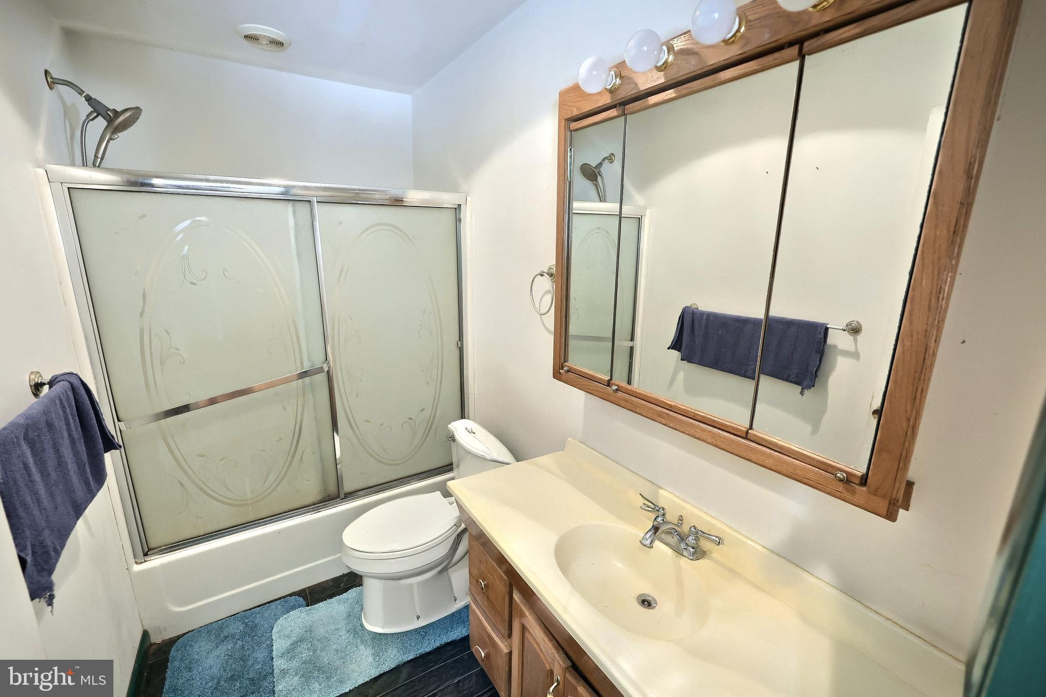 456 Church Road Orrtanna, PA 17353 - Photo 42 of 65 a bathroom with a sink a toilet and shower