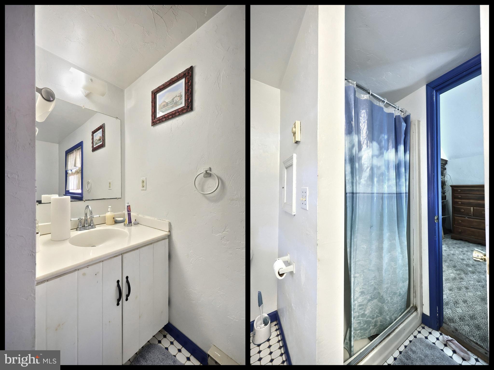 456 Church Road Orrtanna, PA 17353 - Photo 47 of 65 a bathroom with a sink and mirror