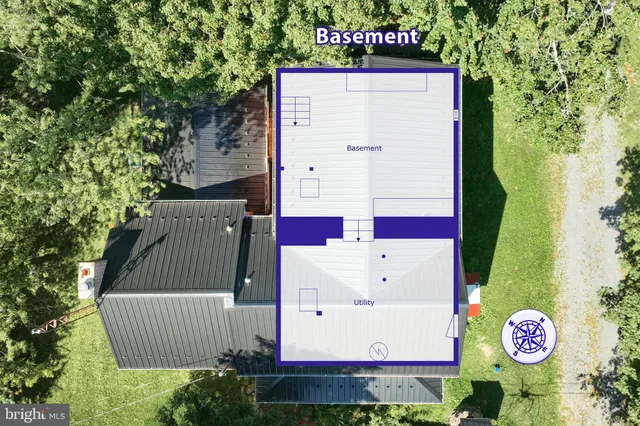 a view of wooden floor and windows in a room