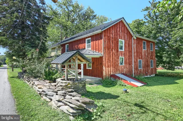 a view of a backyard with a lake view