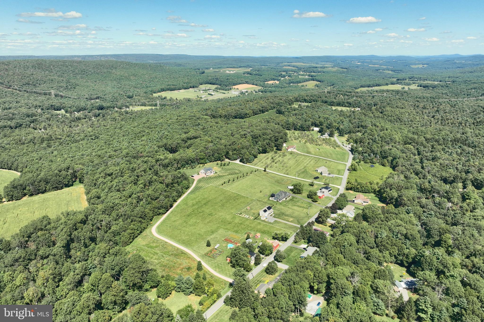 456 Church Road Orrtanna, PA 17353 - Photo 52 of 65 an aerial view of residential houses with outdoor space and trees
