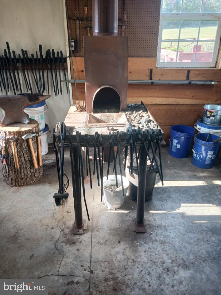 456 Church Road Orrtanna, PA 17353 - Photo 59 of 65 a living room with furniture a fireplace and a flat screen tv
