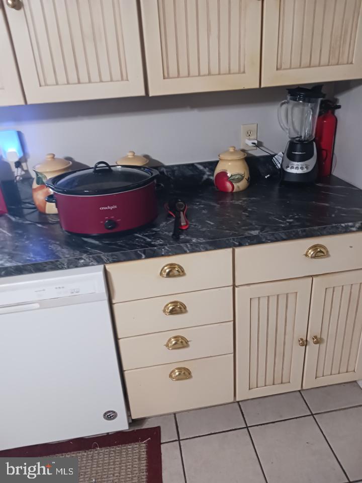 456 Church Road Orrtanna, PA 17353 - Photo 62 of 65 a kitchen with stainless steel appliances granite countertop a sink stove and cabinets